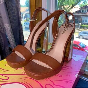 Brown and gold platform heels
